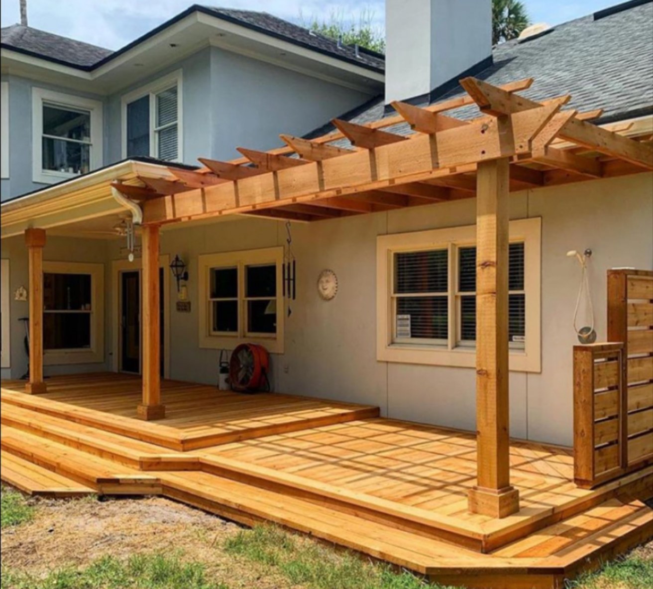 Cedar pergola over a new deck at a Jacksonville home